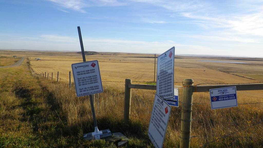 2015 10 21 Encana cumulative impacts at Rosebud, Alberta, well legal land description signs 3