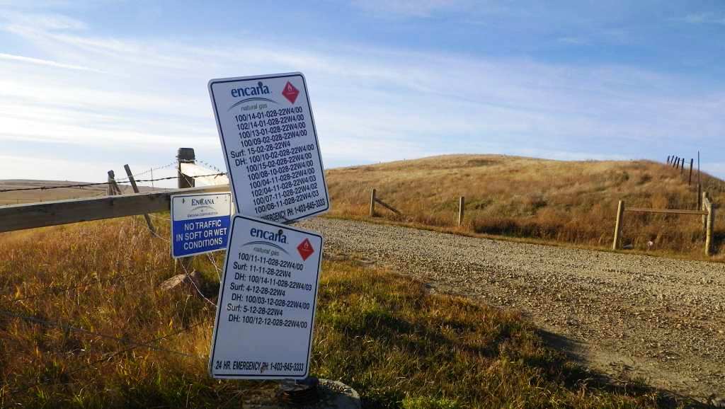 2015 10 21 Encana cumulative impacts at Rosebud, Alberta, well legal land description signs
