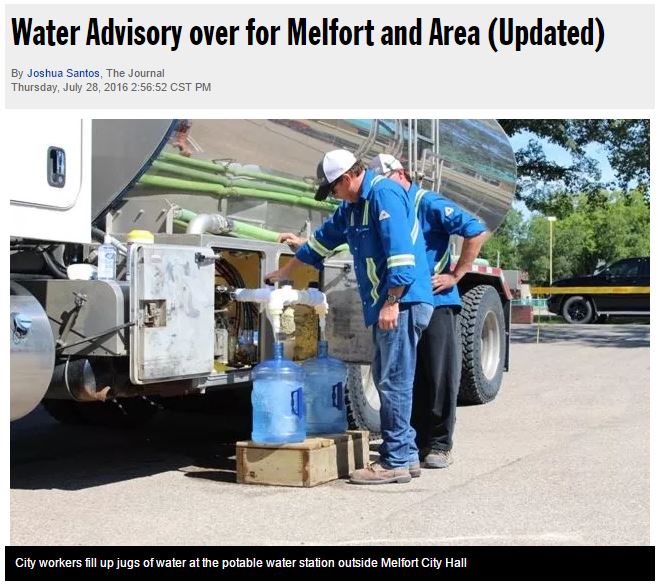 2016 07 28 Melfort workers fill water jugs, re Husky bitumen and chemical additive spill