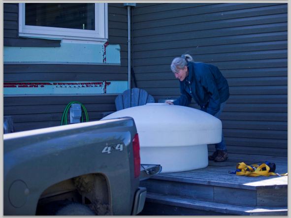 2013 Jessica Ernst trying to load water tank at Rosebud