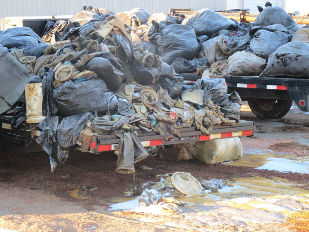 2014 02 22 Waste trailers leaking fluids and unknown number of potentially radioactive filter socks, banned from North Dakota landfills