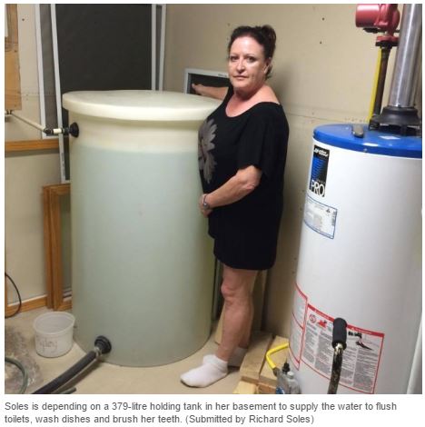 2016 07 26 Carol Soles w 378 litre water tank, CBC News Husky bitimen, chemical spill N Sk river