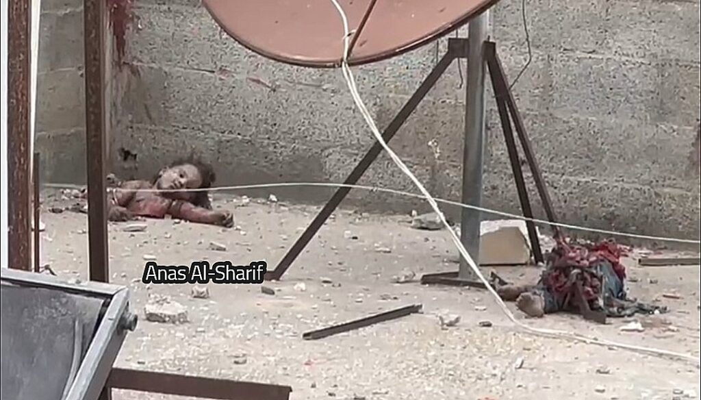 2025 04 25 Gaza: Israel continues bombing and killing hundreds of Palestinian kids during its sham "ceasefire." Photo shows a Palestinian child blown into two. Zionism is crime against humanity.