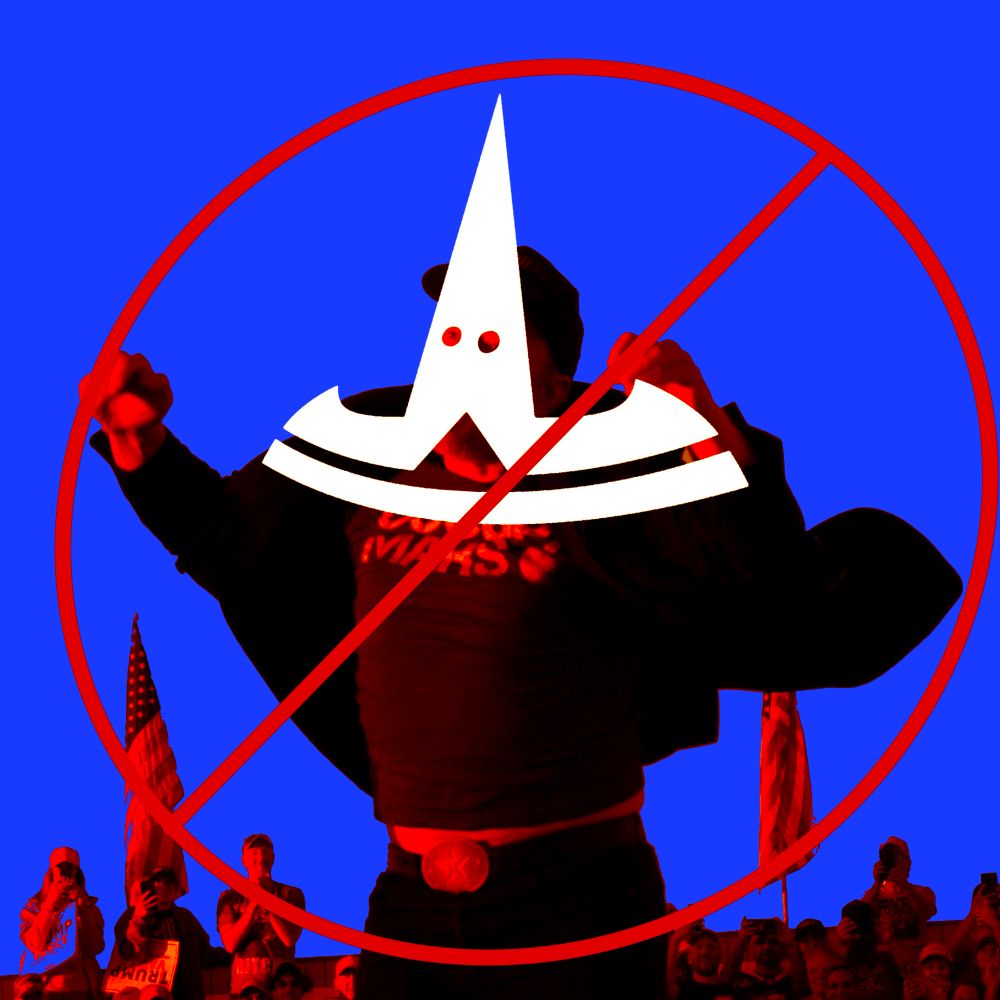 photo of elon musk leaping in the air at one of Trump's lying rallys, with red ban symbol over him, and tesla logo in white over Musk's head like a KKK hood